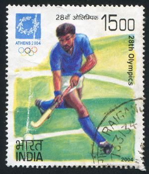 INDIA - CIRCA 2004: stamp printed by India, shows bandy player Games of the XXVIII Olympiad, circa 2004
