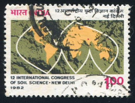 INDIA - CIRCA 1982: stamp printed by India, shows stylized map with continents, circa 1982