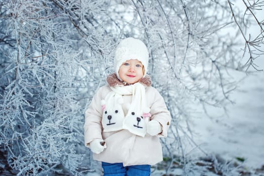 Cute little girl shot close-up on outdoors in winter