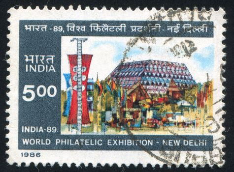 INDIA - CIRCA 1986: stamp printed by India, shows exhibition building and flags, circa 1986