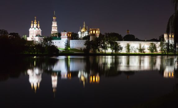 Beautiful view of Novodevichy Convent at night, Moscow, Russia