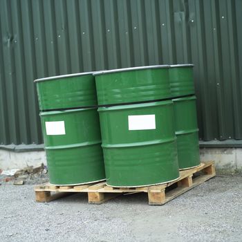 Four Green Oil Drums outdoor