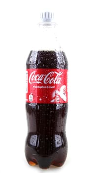 AYTOS, BULGARIA - JANUARY 28, 2014: Coca-Cola isolated on white background. Coca-Cola is a carbonated soft drink sold in stores, restaurants, and vending machines throughout the world.
