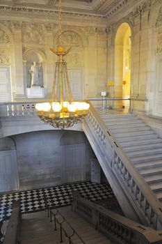 A monumental staircase of the palace of Versailles