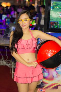 BANGKOK - OCT. 19: An unidentified Presenter pose in Thailand Game Show BIG Festival 2013 on October 19, 2013 at Siam Paragon, Bangkok, Thailand.
