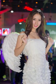 BANGKOK - OCT. 19: An unidentified Presenter pose in Thailand Game Show BIG Festival 2013 on October 19, 2013 at Siam Paragon, Bangkok, Thailand.