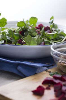 Watercress and beetroot salad with toasted sunflower seeds.