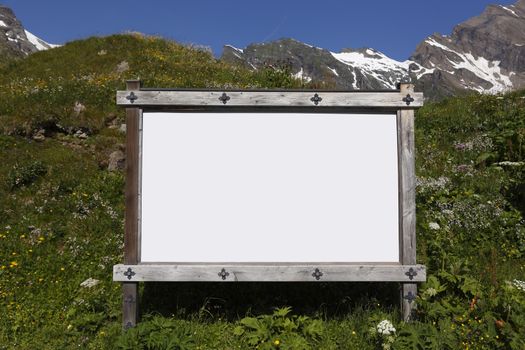 The white blackboard on the large hillside