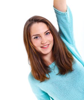 Portrait of happy teenage girl in a blue dress. Isolated over white background.