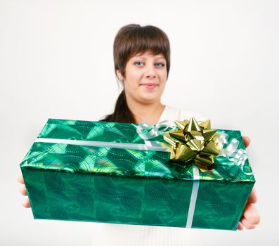 young attractive woman with beautiful packaged gift