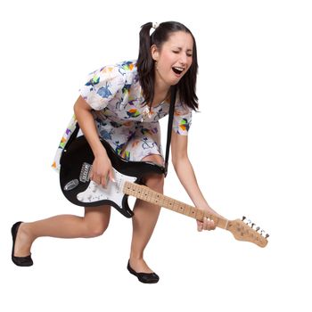 Woman in colorful retro dress, passionately plays the electric guitar, isolated on white background
