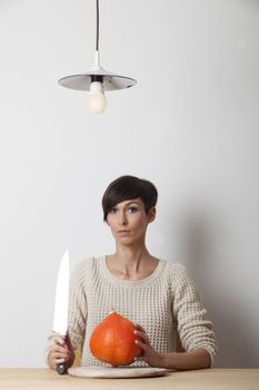 woman and a knife on a table