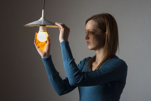 woman with a light bulb