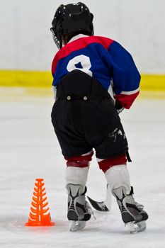 Young hockey player at practice