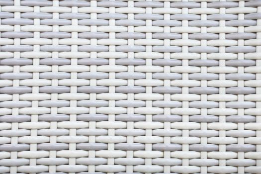Grey and white wicker material as a background
