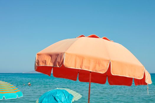 Colorful beach parasol on a sunny day