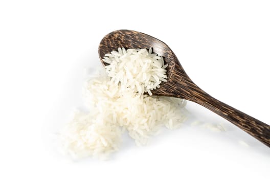 Rice grain in wooden spoon on white background with clipping path  :  Selective Focus