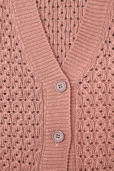 Buttons and breast of a wool cardigan