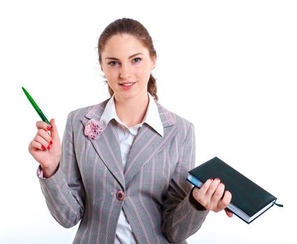 Portrait of university girl holding books and smiling. Isolated over white background.