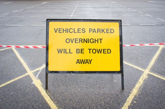 Notice in a car park forbidding overnight parking