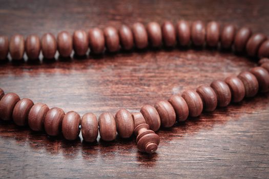 Close up of wooden Islamic prayer beads