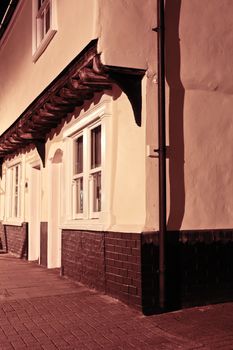 Medieval town houses in England illuminated by street light