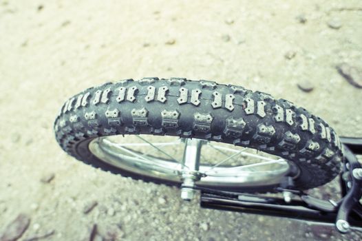 Close up of a bike tyre with shallow depth of field