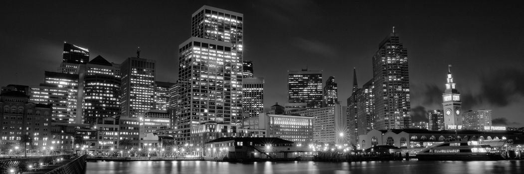 Skylines lit up at night in a city, San Francisco, California, USA