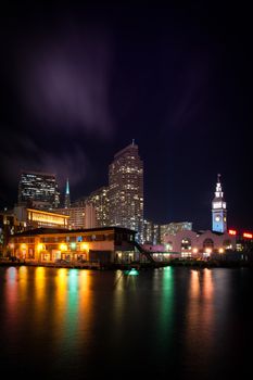 Clock tower of Ferry Building lit up at night, The Embarcadero, San Francisco, California, USA
