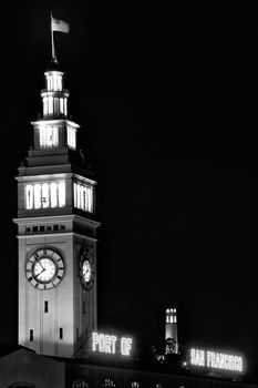 Clock tower of Ferry Building lit up at night, The Embarcadero, San Francisco, California, USA