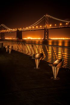 Suspension bridge lit up at night, Bay Bridge, San Francisco Bay, San Francisco, California, USA