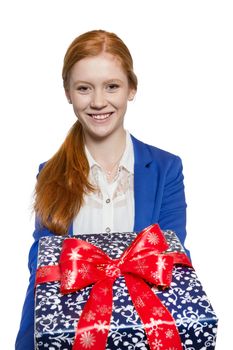Young red haired businesswoman presents present with a big smile