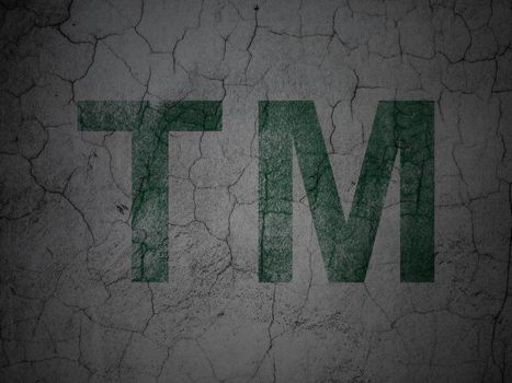 Law concept: Green Trademark on grunge textured concrete wall background, 3d render