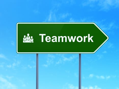 Business concept: Teamwork and Business Team icon on green road (highway) sign, clear blue sky background, 3d render