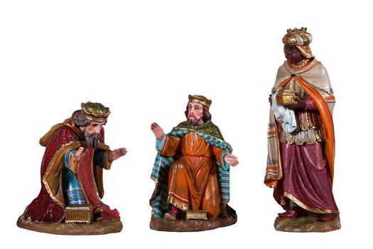 Wooden Sculptures nativity scene, illustrating the three kings isolated on white background