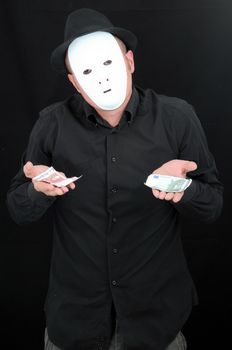 A Masked Mime Holding Euro Currency in Both Hands