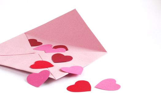 Envelope with red hearts for valentine day on white background