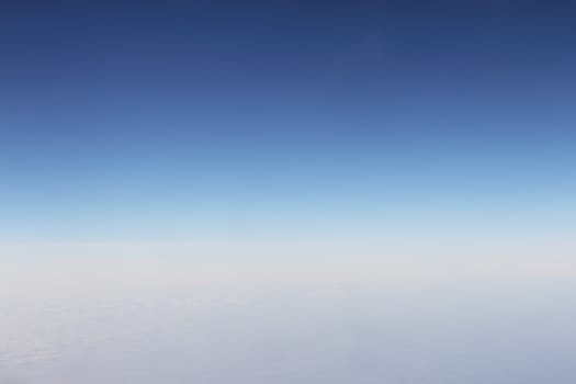View from over a  layer of thick soft clouds
