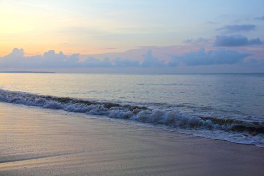 Beautiful surf on beach at sunrise in vietnam