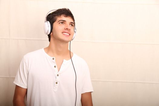 A young, latin man with a headphones
