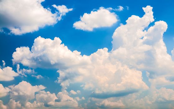 View on clouds in the blue sky background