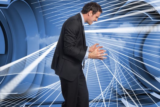 Stressed businessman gesturing against abstract design in futuristic structure