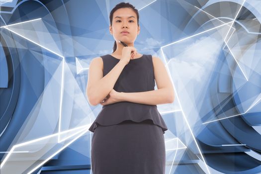 Thinking asian businesswoman against white abstract angular design