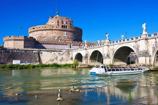 Famous Saint Angel castle and bridge over Tiber river in Rome, Italy