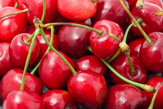 Beautiful red fresh cherry macro photo background