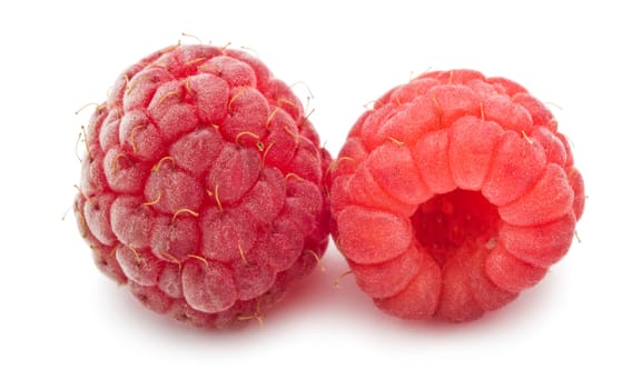 Ripe red raspberries isolated on white background