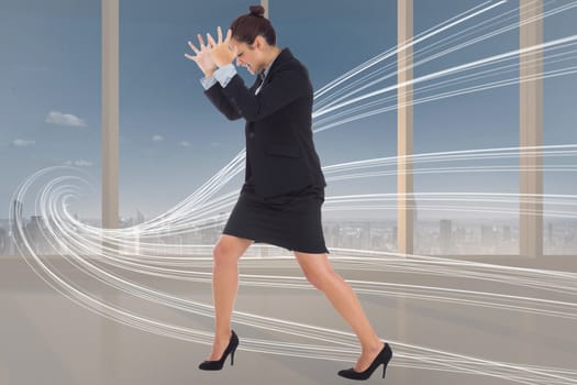 Angry businesswoman gesturing against abstract white line design in room