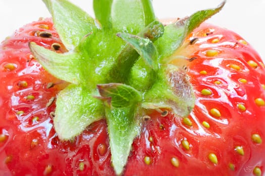 Macro of a ripe strawberry, top view.