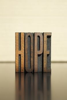 The word HOPE written in vintage letterpress type