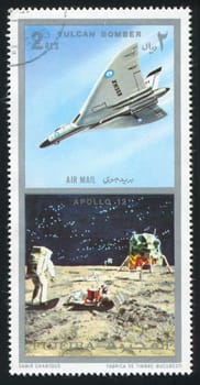 FUJEIRA - CIRCA 1985: stamp printed by Fujeira, shows Vulcan Bomber and Apollo 12, circa 1985